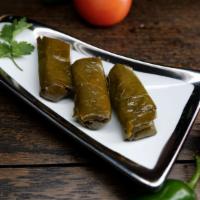 Dulma · Stuffed grape leaves, filled with rice and herbs.
