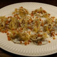 Mantu · Dumplings stuffed with ground beef, onions and spices.