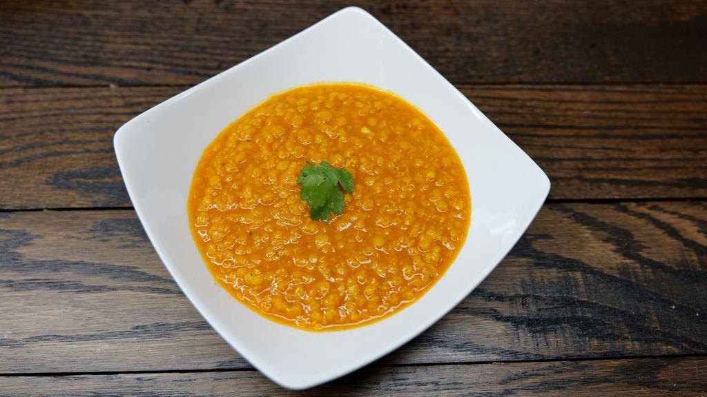 Dawl · Lentils cooked with special herbs and spices.