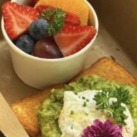 Avocado Toast · Poached egg, brioche toast, olive oil, lemon zest, served with mixed fruit.