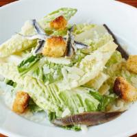 Caesar Salad · Served with homemade croutons,  anchovies, shaved parmesan, and homemade caesar dressing.