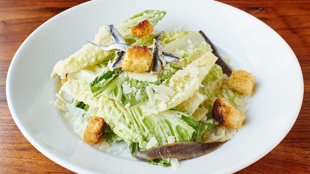 Caesar Salad · Served with homemade croutons,  anchovies, shaved parmesan, and homemade caesar dressing.