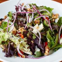 Mixed Greens · Served with spring mix, Castelvetrano olives, red onion, gorgonzola, homemade candied walnut...
