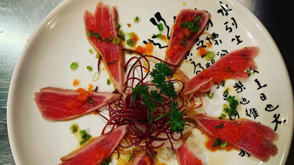 #23. Tuna Tataki · Seared tuna with ponzu sauce and green onion.