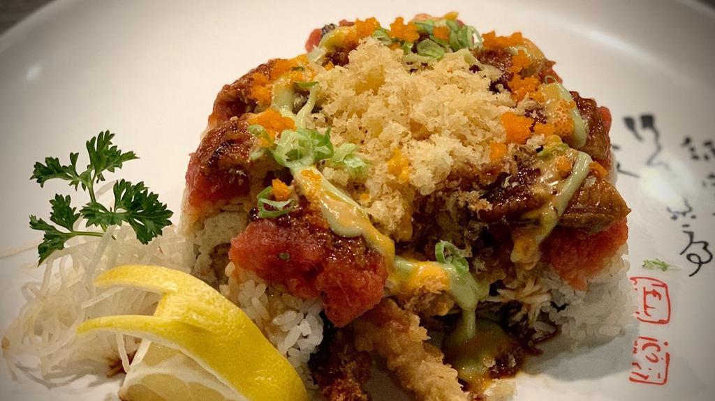 Triple S · Shrimp tempura, softshell crab, spicy tuna topped with unagi, spicy tuna, crunch and fish eggs. Sauce: Unagi sauce, Spicy mayo, wasabi sauce