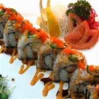 James · Spicy tuna, imitation crab, shrimp tempura topped with scallop, jalapeno and fish eggs. Sauc...
