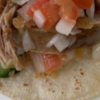 Tacos · Tortilla and meat.