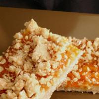 Apricot Bar · Tart and sweet apricots enveloped in a delicious oatmeal crumb.