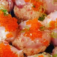 Hamachi Bon-Bons · Hamachi wrapped around crab mix topped with scallions, tobiko, & sesame soy.