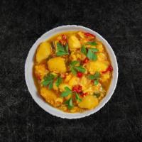 Soulful Cauliflower  & Potatoes  · Fresh cauliflower and potatoes slow-cooked in a curry sauce with herbs and spices.