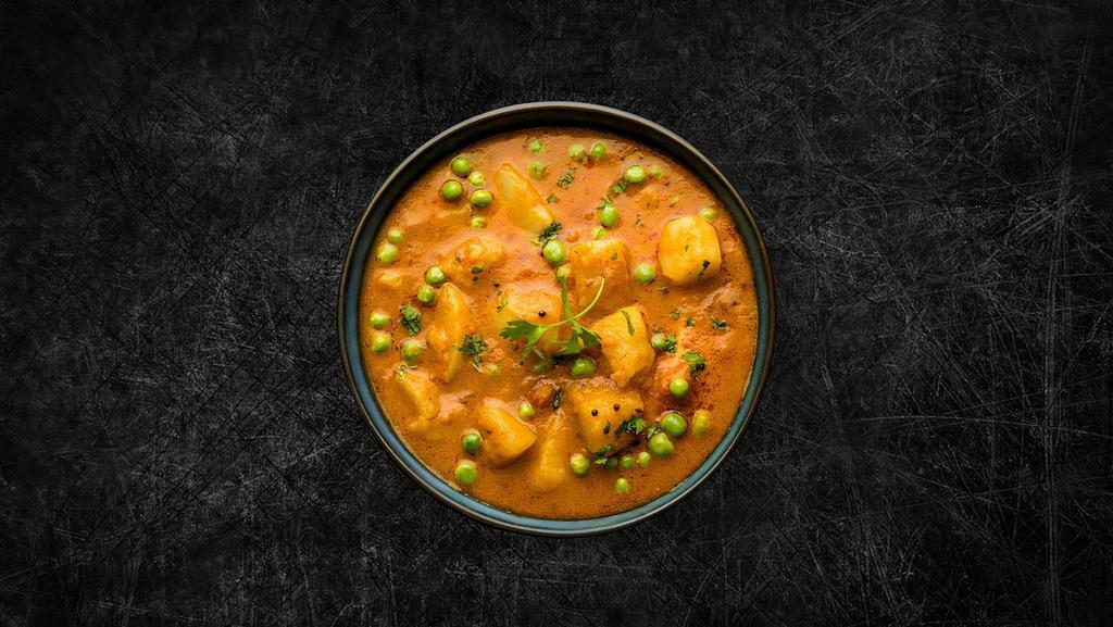 Soulful Peas & Potatoes  · Peas and potatoes, simmered to perfection in an onion, tomato, and Indian whole spice curry. Served with the basmati rice.