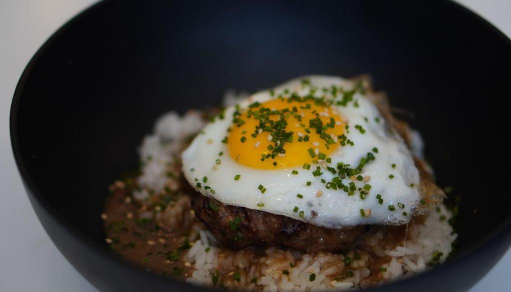 Loco Moco · 1/2lb. Certified Angus Chuck Patty, Two Eggs Any Style on Steamed Rice; Topped with Miso Gravy