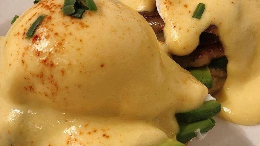 Sausage Benedict · Homemade Whiskey Habanero Sausage Patties, Caramelized Onions, Poached Eggs, English Muffin, House Special Hollandaise, Choice of Potatoes