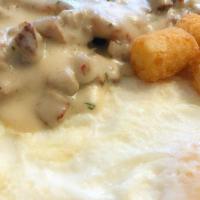 Buttermilk Biscuits & Gravy · Buttermilk Biscuits with house made sausage gravy, served with 2 Eggs Any Style and Choice o...