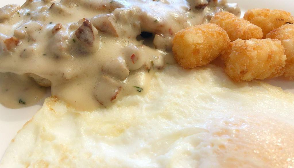 Buttermilk Biscuits & Gravy · Buttermilk Biscuits with house made sausage gravy, served with 2 Eggs Any Style and Choice of Hash Brown, Country Potatoes, or Tater Tots