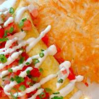 California Omelet · Spicy Chorizo, 3 Cheese Blend and Avocado; Topped with Pico de Gallo and Sour Cream; Served ...