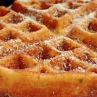 Corn Waffle Combo · *Not Your Typical Corn Waffle Topped with Powdered Sugar, Choice of Bacon or Sausage, and 2 ...
