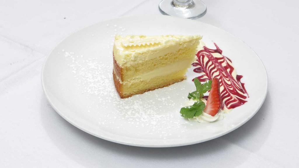 Lemon Marscapone Cake · Do dessert the Italian way with this light, creamy limoncello cake, made with a rich combination of vanilla sponge cake.