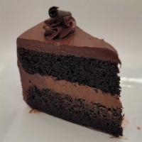 Double Chocolate Iced Cake · Layer of chocolate cake, rich chocolate frosting,and chocolate sauce.