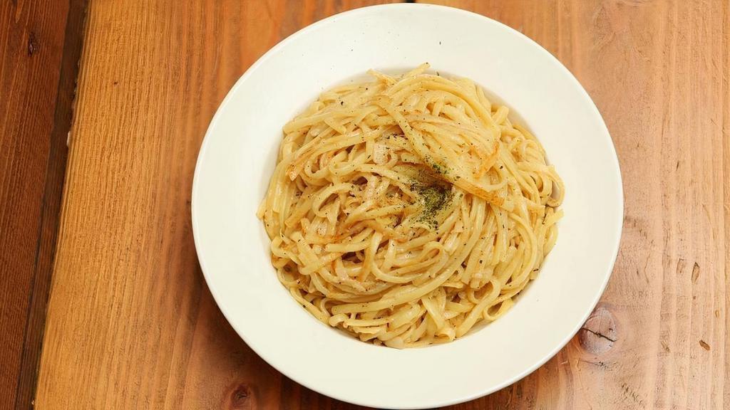 Garlic Noodles · Made with fresh garlic and real butter.