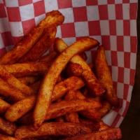 Cajun Fries · extra crispy coated french fries topped with cajun seasoning, very mild spicy, served with k...