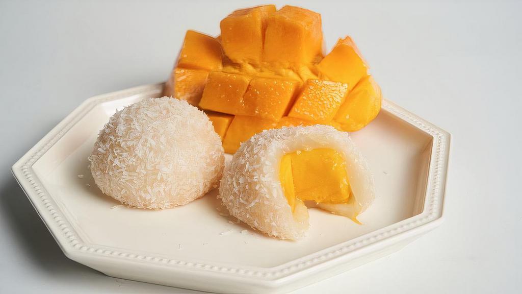 Z19. Mango Daifuku 2pcs (Vegan) · Sweet Rice Flour, Fresh Cut Mango Chunk, Coconut Flakes