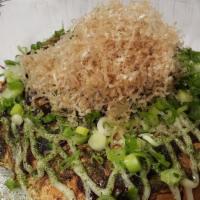 Okonomiyaki Appetizer · grilled japanese seafood pancake, made with flour, egg, cabbage, seafood mix and topped with...