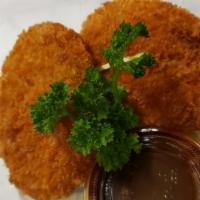 Vegetable Croquette Appetizer · Breaded and deep-fried mashed potato patties served with tonkatsu sauce.