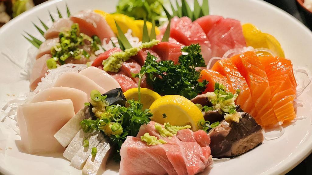 30pc Sashimi Deluxe  · Chef's choice of five or more different kinds of sashimi. Served with two salads and two rice.
