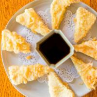Agedashi Tofu · Lightly tempura fried tofu with scallions and bonito flakes served with light soy-dashi sauce.