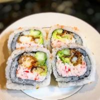 Spider Roll · Soft shell crab, avocado, cucumber, and crab salad
Masago outside