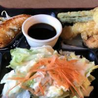 Salmon Teriyaki · Served with soup, salad and rice. Grilled salmon with teriyaki sauce.