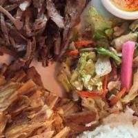 Combo Shawarma Plate · Slow-roasted, thinly-sliced lamb, and chicken.