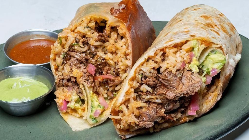 Birria Burrito · Flour tortilla, crispy melted cheese, braised short rib, jalisco salsa, herb lime rice, pickled onions, and avocado. Served with a side of side jalisco salsa and avocado tomatillo salsa.