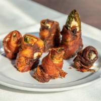 Bacon Wrapped Jalapeño Poppers · Served with jalapeño ranch.