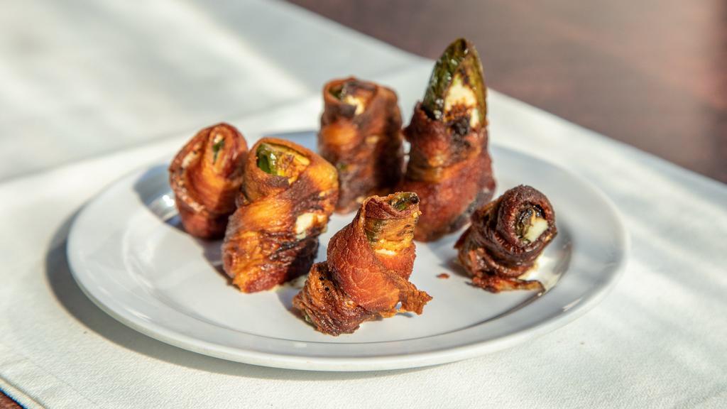 Bacon Wrapped Jalapeño Poppers · Served with jalapeño ranch.