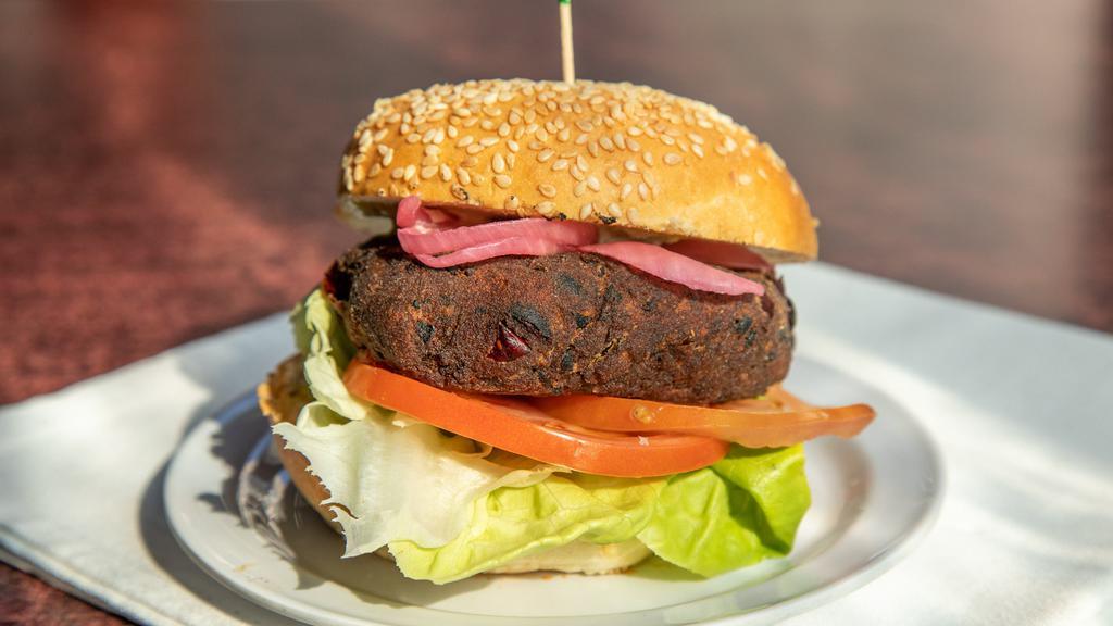 Black Bean Burger · House black bean patty with butter lettuce, tomato, pickled red onion + jalapeño ranch.