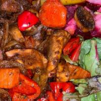 Veggie Tibs · Sautéed portobello mushroom, onions, garlic, ginger, tomatoes, red and green bell peppers, m...
