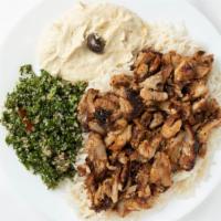 Chicken Shawarma · Slices of chicken seasoned and grilled rotisserie style.