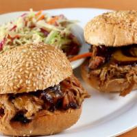 The Texas Two-Step · 2 memphis pulled pork, texas brisket, or smoked chicken sliders.