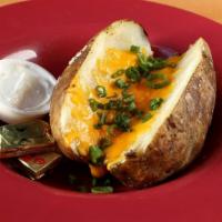 The Loaded Potato · Butter, sour cream, cheddar cheese, & chives.