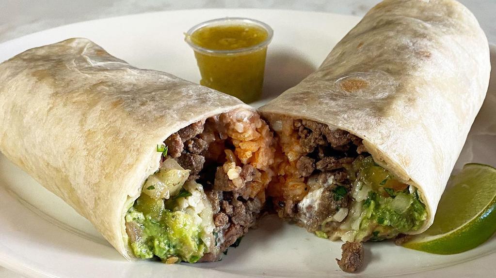 Steak Super Burrito · Our super burrito is made with the meat of your choice with rice, beans, sour cream, guacamole, and cheese.