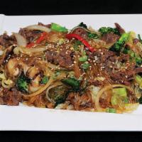 Beef Chapchae · Clear noodles stir fried with marinated rib eye steak and vegetables.