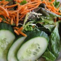 House Salad · Baby mixed greens, cucumber, carrots and tomato.