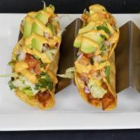 5. Al Gobernador Tacos (3) · Three crispy shrimp tacos topped with lettuces, chopped cucumber, tomato and a special sauce...