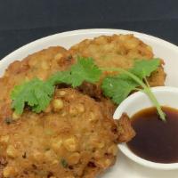 Spicy Corn Fritters · Served with Indonesian soy sauce.