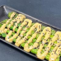 Grilled Asparagus · Topped with a creamy sesame dressing.