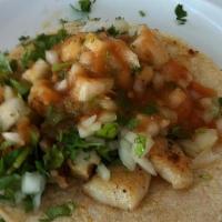 Fish Taco · Onions, cilantro and salsa.