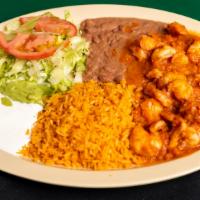 Camarones A La Diabla · Large tiger prawns, sauteed in butter and special hot sauce, served with rice, beans salad a...