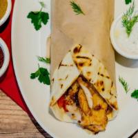 Chicken Gyro Wrap · Slow cooked marinated thin sliced chicken. Served in lavash bread, with lettuce, tomato, oni...